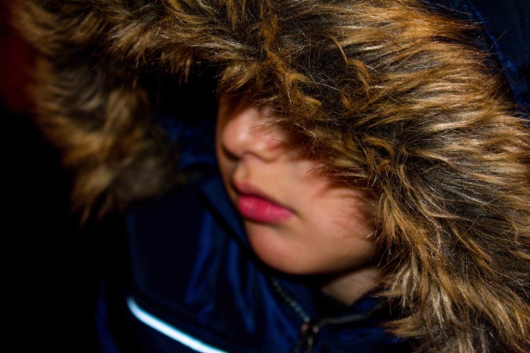 close-up-boy-wearing-fur-coat